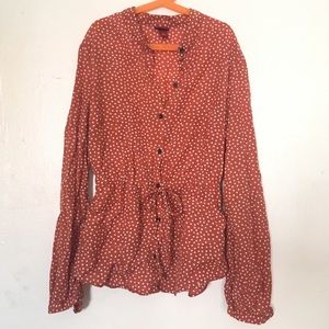 Burnt orange polka dot shirt